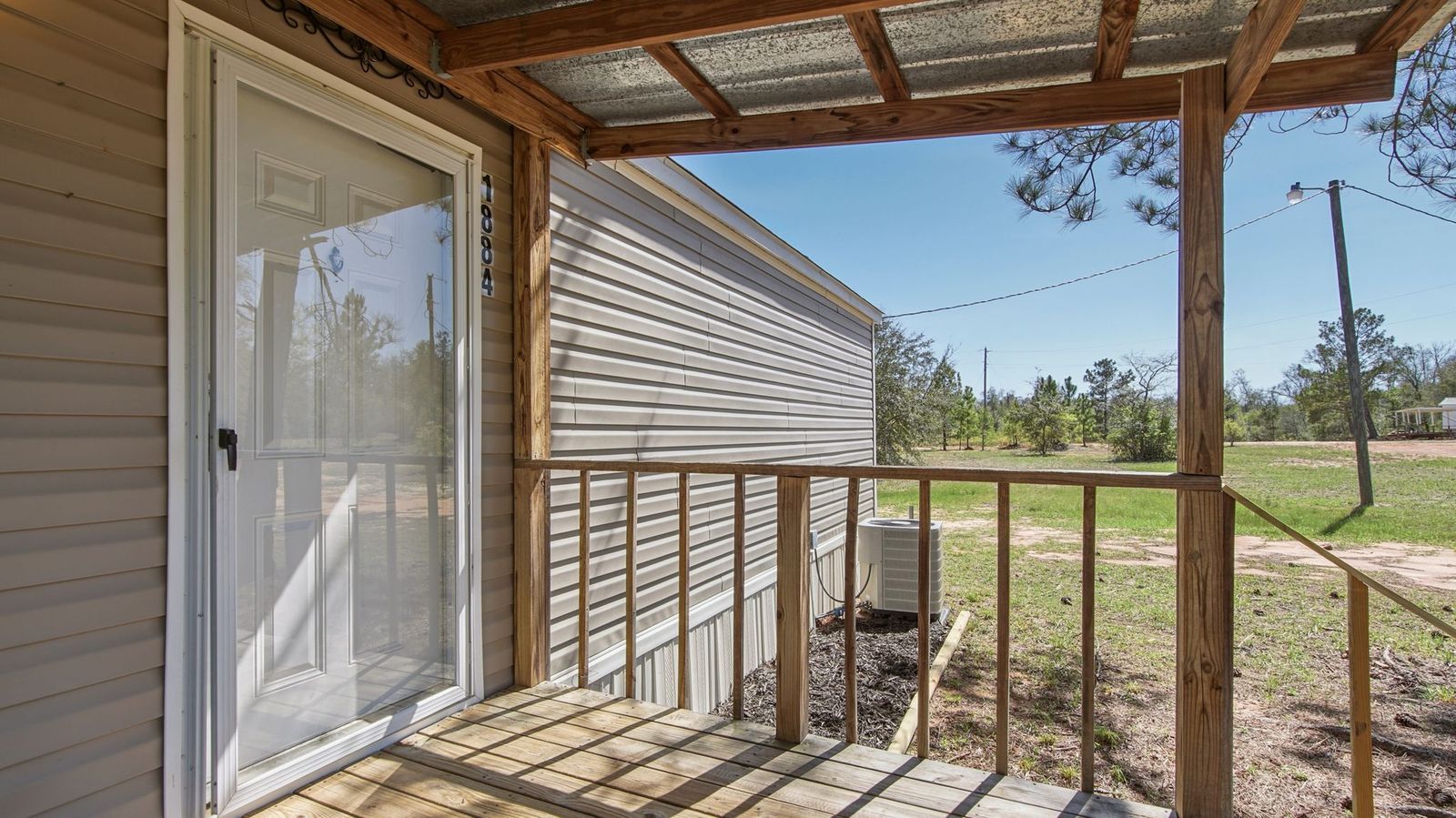 2015 Clayton Manufactured Home with 3 bedrooms, 2 bathrooms, 1216 sqft, 76 x 16 layout, Windzone 2 rating, land included. - Image 11