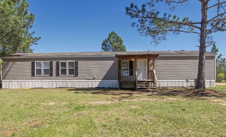 2015 Clayton Manufactured Home with 3 bedrooms, 2 bathrooms, 1216 sqft, 76 x 16 layout, Windzone 2 rating, land included. - Image 2
